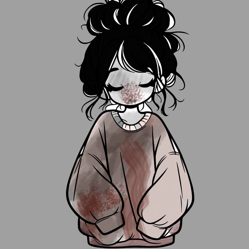 girl with baggy sweatshirt and messy bun