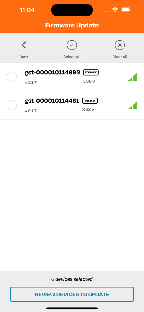 Realm App - Firmware update screen in the Realm App showing a list of Globalstar satellite transmitter devices ready for selection
