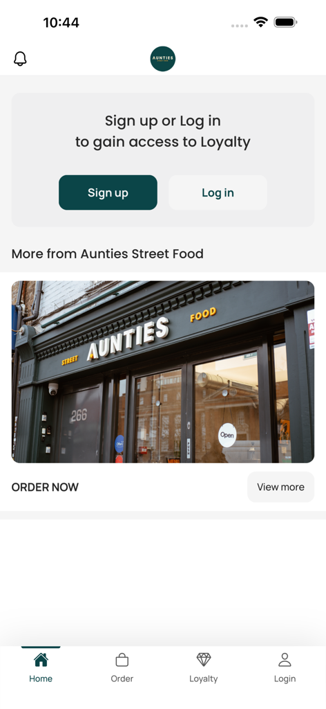 Aunties Street Food - The home screen of the Aunties Street Food app featuring a sign up section for the loyalty program and a photo of the physical storefront