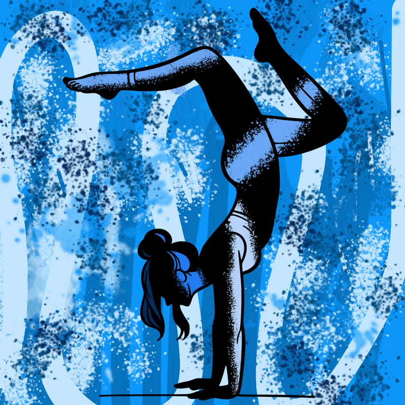 a woman doing a handstand