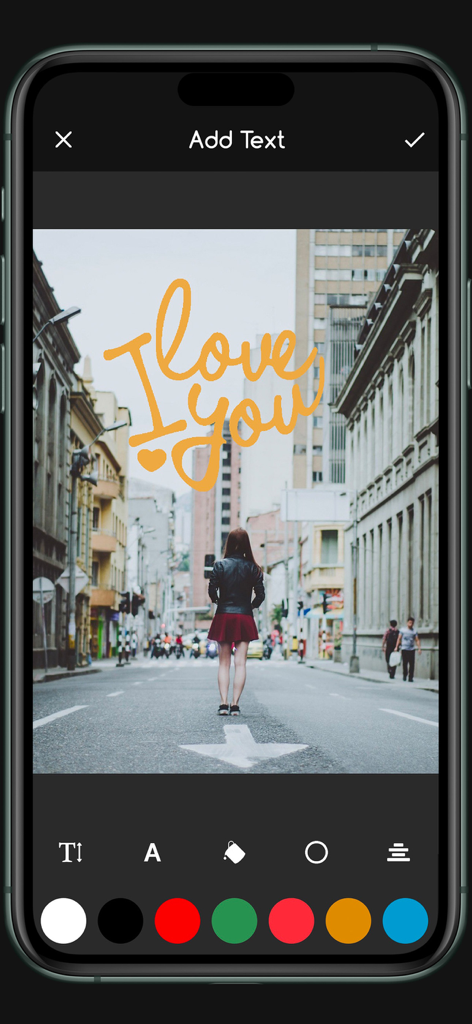 Mobile app interface of Font Candy showing yellow cursive I love you text overlaid on a city street photograph