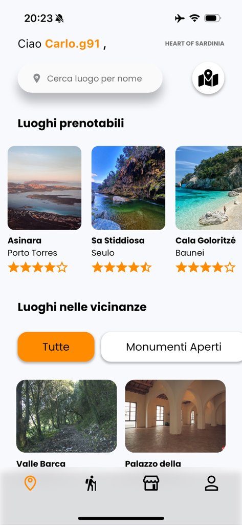 Heart of Sardinia - Heart of Sardinia mobile app interface showing a personalized home screen with bookable travel locations like Cala Goloritze and Asinara