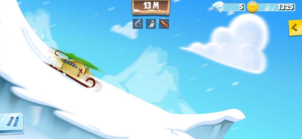 A penguin test dummy sliding down a snowy hill on a sled in Learn 2 Fly