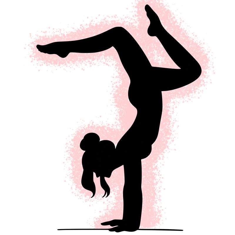 a woman doing a handstand