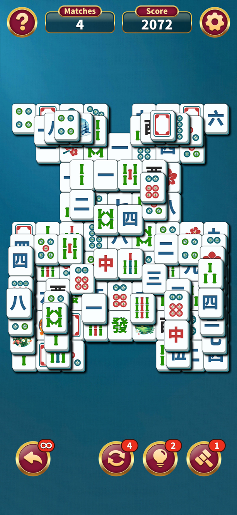 Mahjong Solitaire: Match Game - Un plateau classique de Mahjong Solitaire avec le score des tuiles et les outils du jeu.