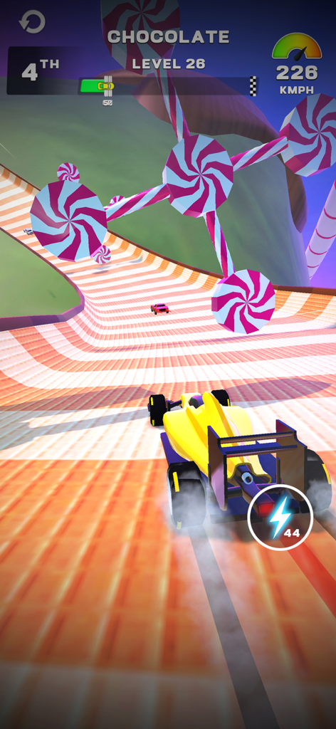 MR RACER : Stunt Mania - Yellow racing car navigating a chocolate and candy themed stunt track in MR RACER Stunt Mania