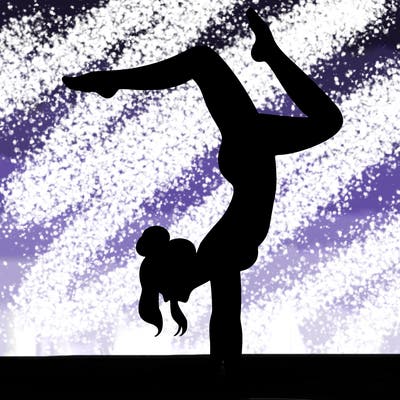 a woman doing a handstand