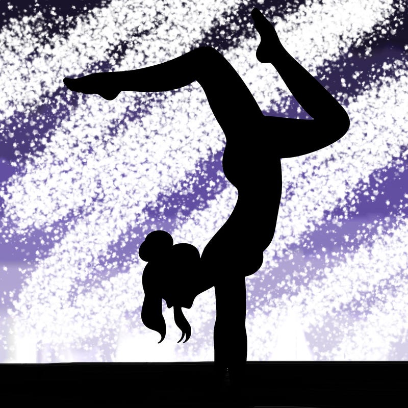 a woman doing a handstand