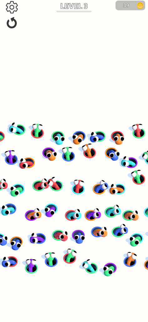 Hole Worm - Colorful worms peeking out of matching holes in the Hole Worm puzzle game