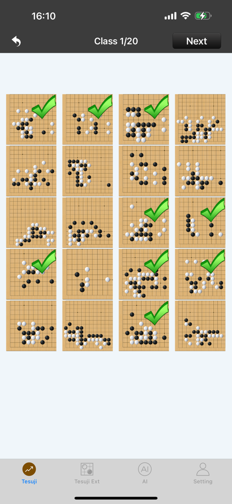 Grade de quebra-cabeças táticos de tabuleiro de Go no aplicativo Tesuji Library