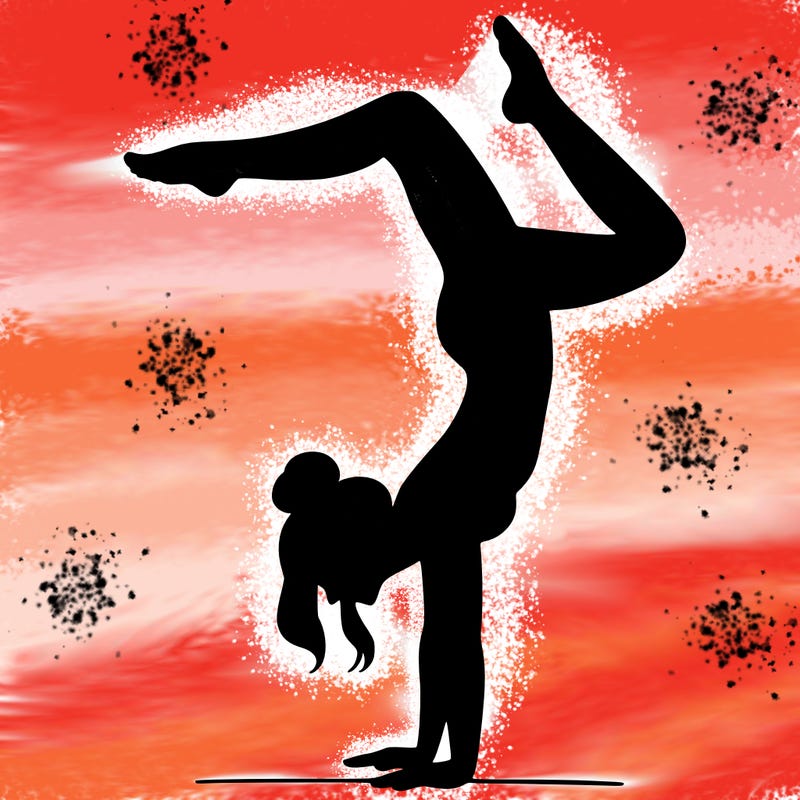 a woman doing a handstand