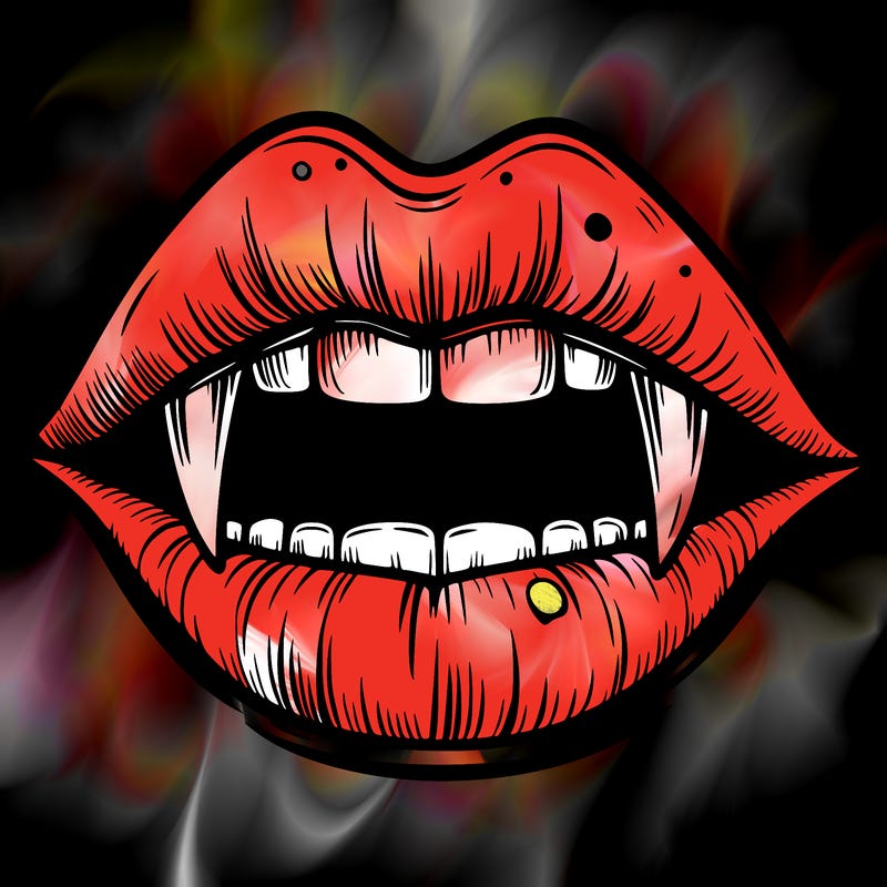 lips with vampire teeth