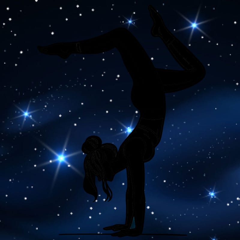 a woman doing a handstand