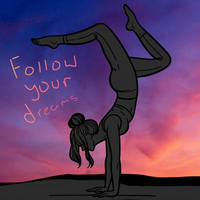 a woman doing a handstand