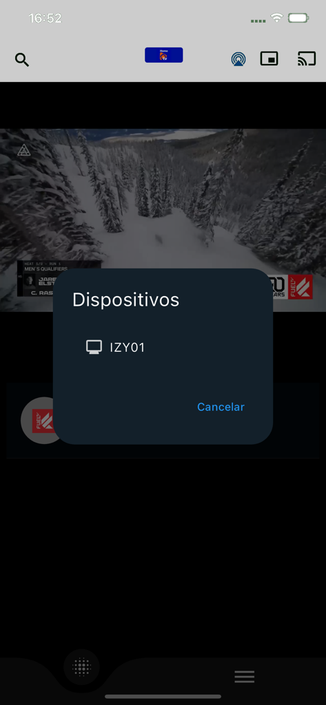 Home TV - Interfaz de la aplicación Home TV que muestra una ventana emergente de selección de dispositivo titulada Dispositivos sobre un video de un paisaje de montaña nevada.