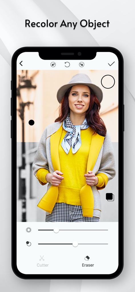 Color Pop - Photo Editor - Interface of Color Pop photo editor app showing a selective color splash effect on a woman wearing a yellow jacket