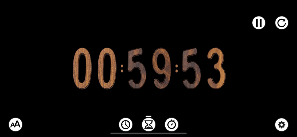 Digital timer display featuring a rustic wood grain font on a dark background