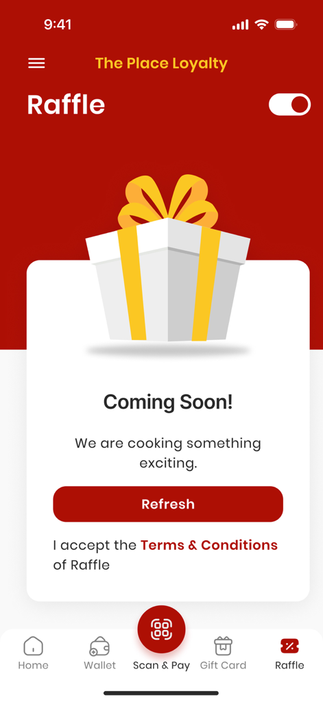 The Place Loyalty - Raffle feature screen in The Place Loyalty app showing a gift box icon and a coming soon message