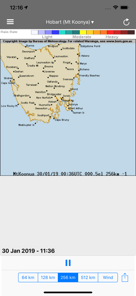 A weather radar map of Tasmania within the TAS Fires app showing rain rate data from the Bureau of Meteorology
