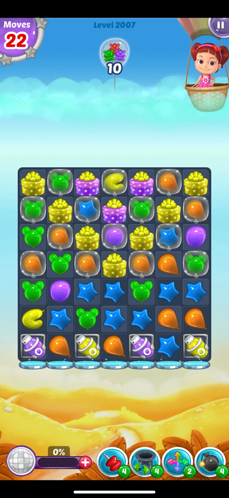 Gameplay of Balloon Paradise Match 3 showing a grid of colorful balloons and Belle in a hot air balloon.