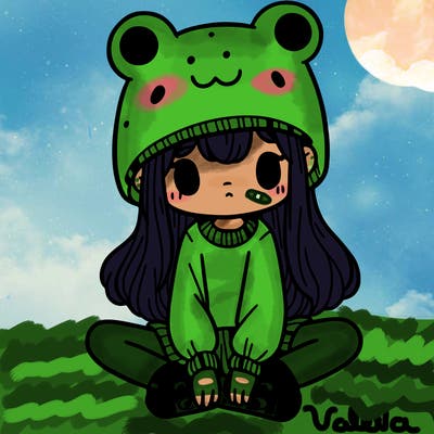 a girl wearing a frog hat and some frog socks
