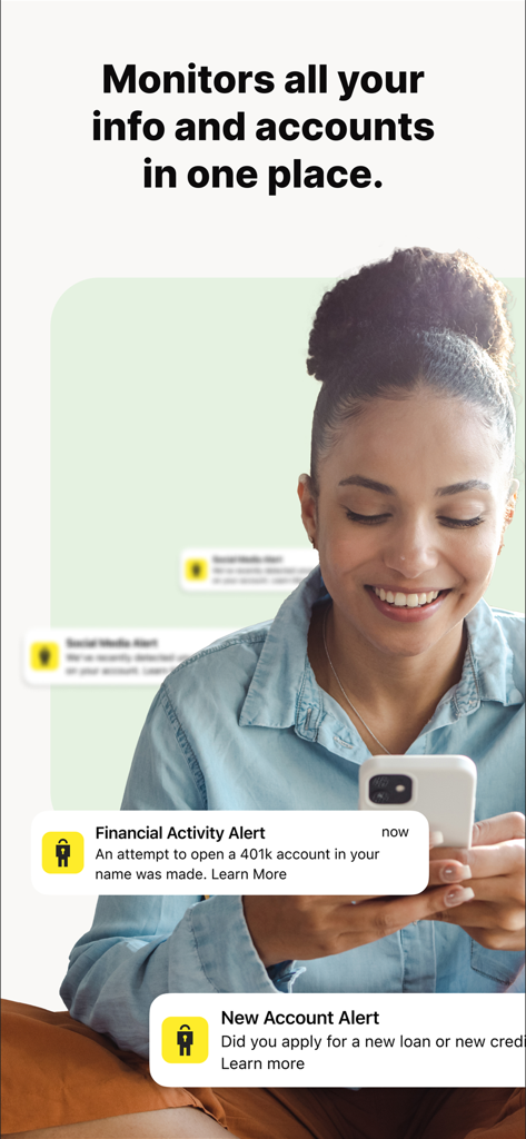 A woman using the LifeLock app which displays financial and identity alerts