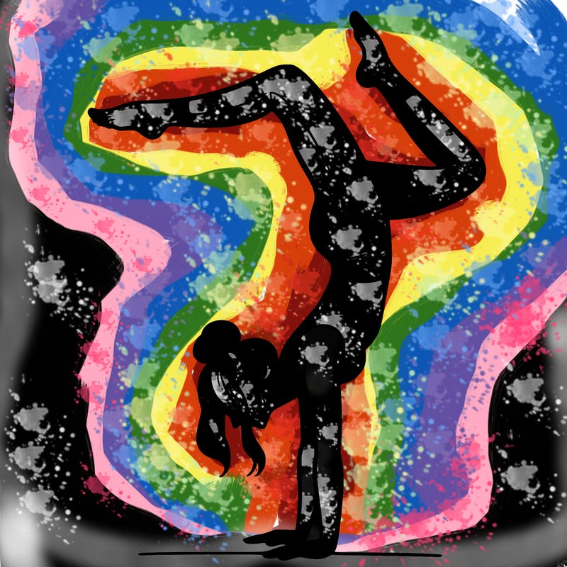 a woman doing a handstand