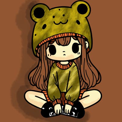 a girl wearing a frog hat and some frog socks