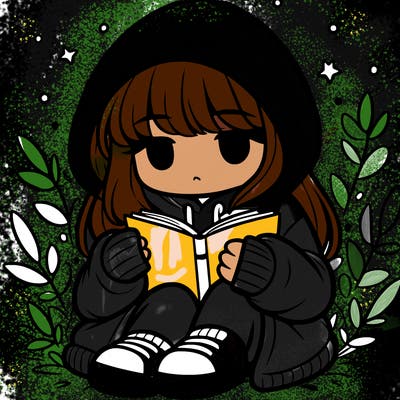 girl in oversized hoodie reading a book