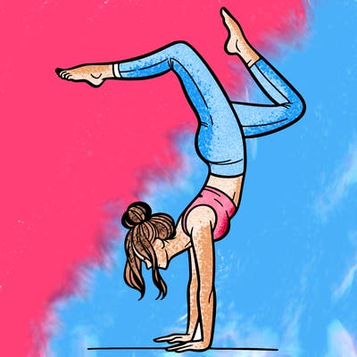 a woman doing a handstand