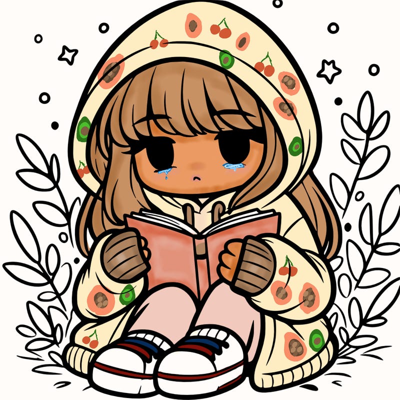 girl in oversized hoodie reading a book