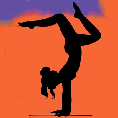 a woman doing a handstand
