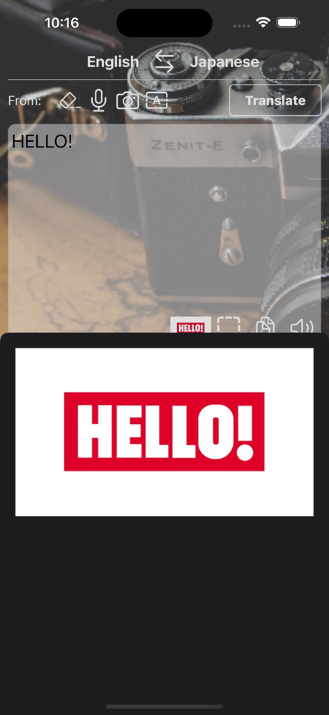 Interface do aplicativo QTranslate mostrando a função de texto em tela cheia com a palavra HELLO em uma grande caixa vermelha