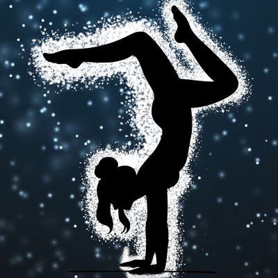 a woman doing a handstand