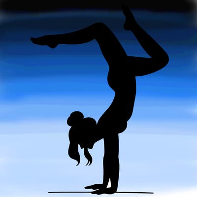 a woman doing a handstand