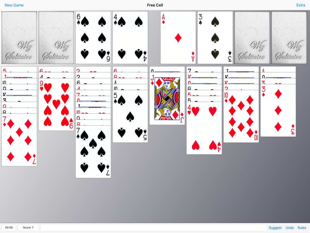 Wiz Solitaire - Captura de pantalla de iPad de Wiz Solitaire jugando la variante de juego de cartas Free Cell.