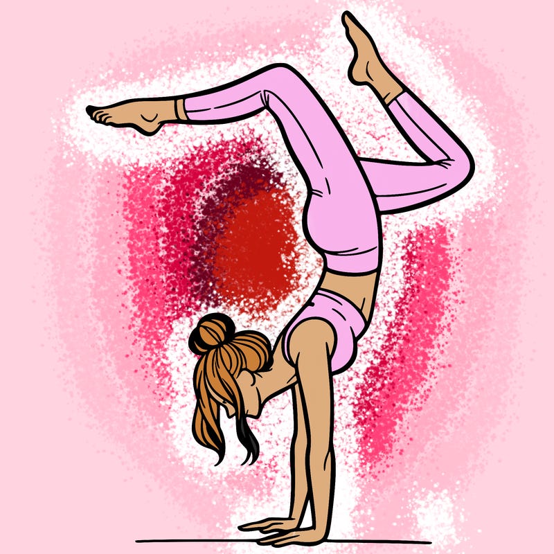 a woman doing a handstand