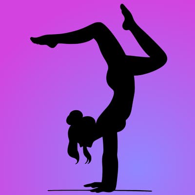 a woman doing a handstand