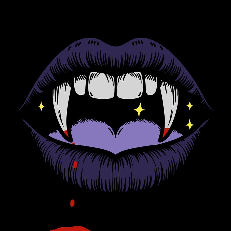 lips with vampire teeth
