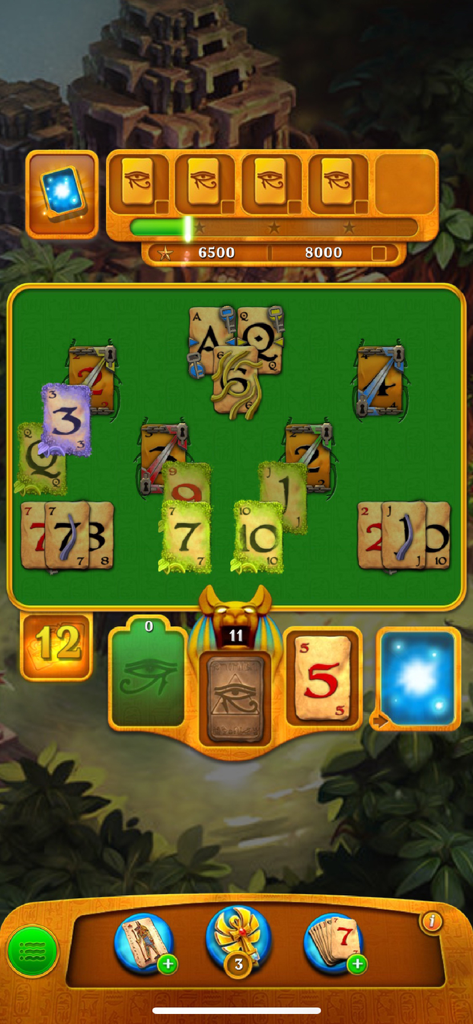 Gameplay screen of Pyramid Solitaire Saga showing card matching in an Ancient Egyptian setting.