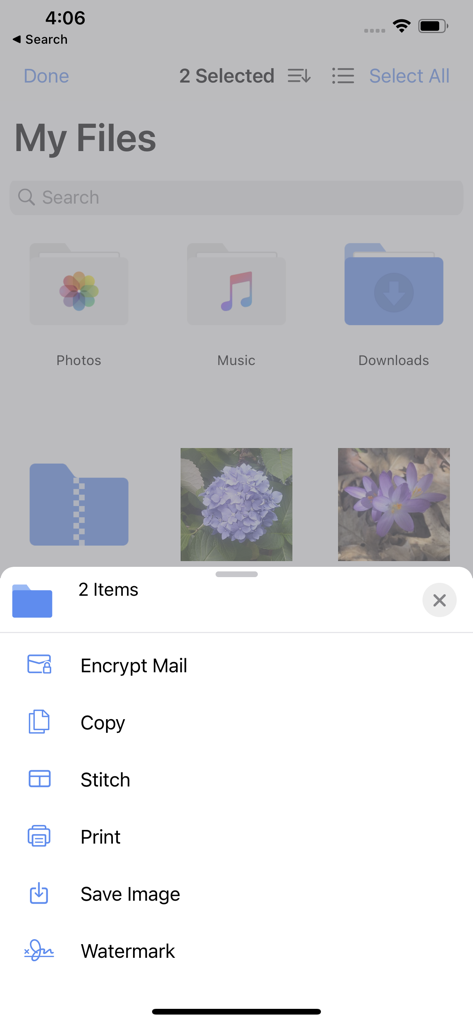 WinZip: #1 zip & unzip tool - Interface de l'application mobile WinZip affichant les options de gestion des fichiers et le menu d'actions pour les éléments sélectionnés.