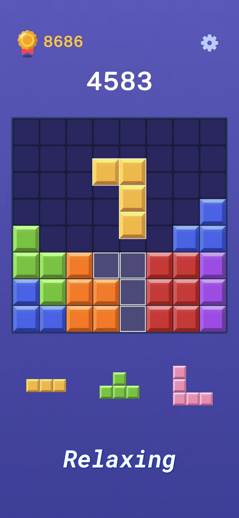 カラフルなブロックとミニマリストUIを備えたリラックスできるブロックパズルゲーム画面