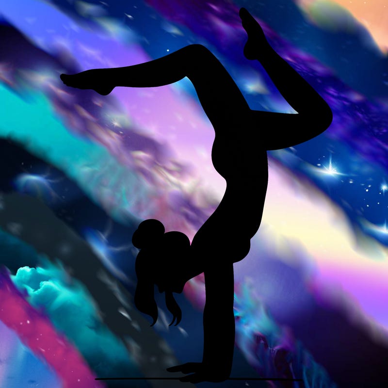 a woman doing a handstand