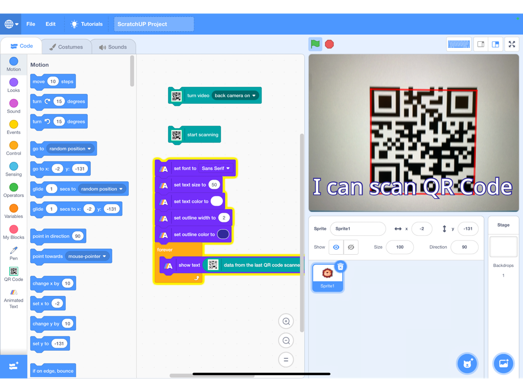 ScratchUP - Interface of ScratchUP app showing block coding used to scan a QR code with an iPad camera.