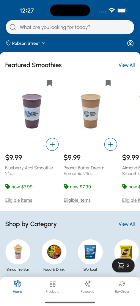 Body Energy Club Canada - Pantalla de inicio de la aplicación Body Energy Club Canada que muestra una selección de batidos y categorías de tiendas.