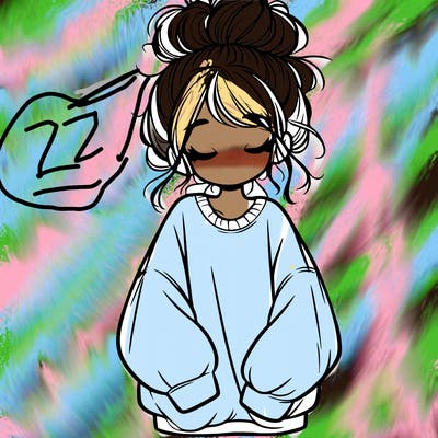 girl with baggy sweatshirt and messy bun