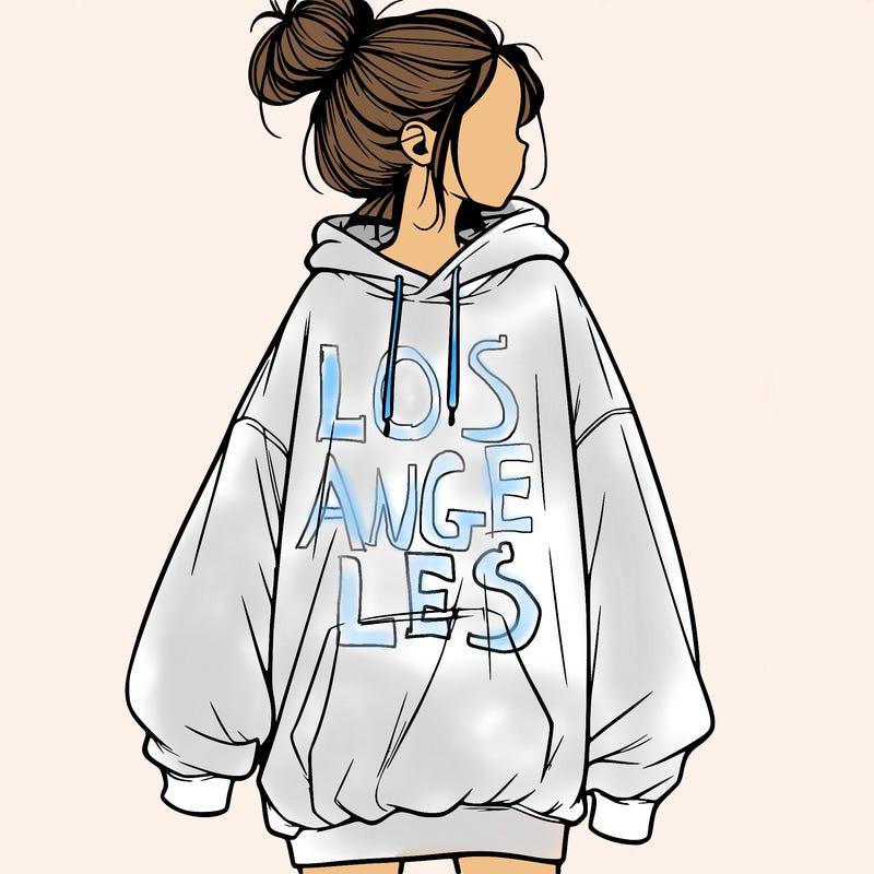 realistic girl with a oversized sweatshirt on and a bun