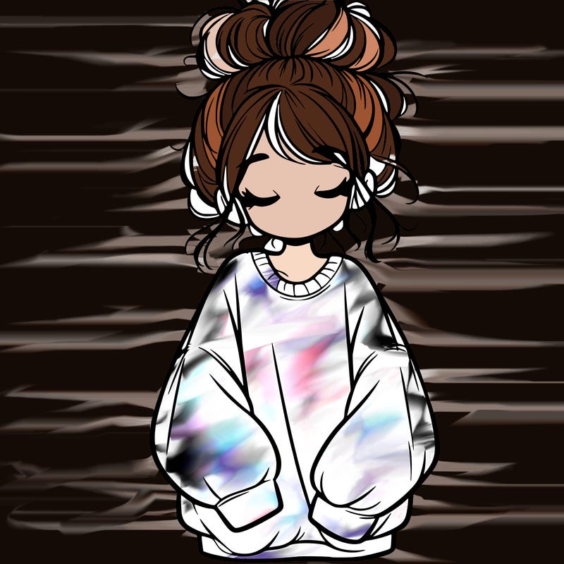 girl with baggy sweatshirt and messy bun