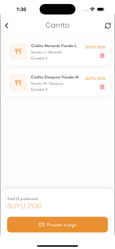 Delishop - Pantalla del carrito de compras en la aplicación Delishop que muestra los artículos de crédito de comida y un botón para proceder al pago