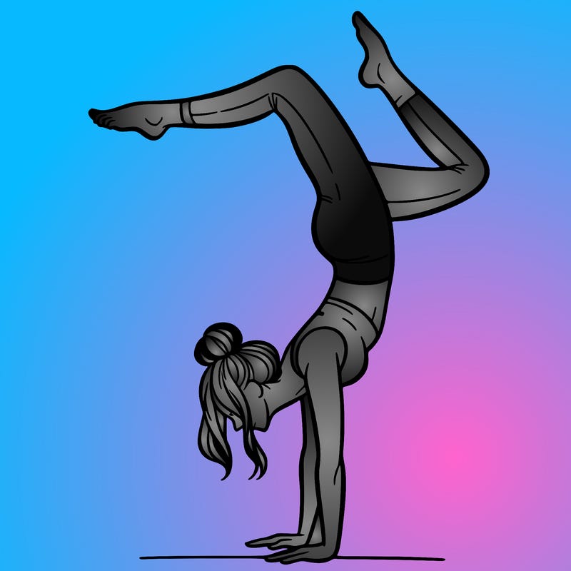 a woman doing a handstand